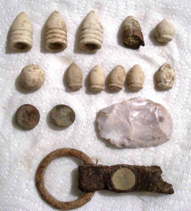 Nice bunch of artifacts recovered by Mark Daughtrey. Note the strange little bullet in the upper right corner !?