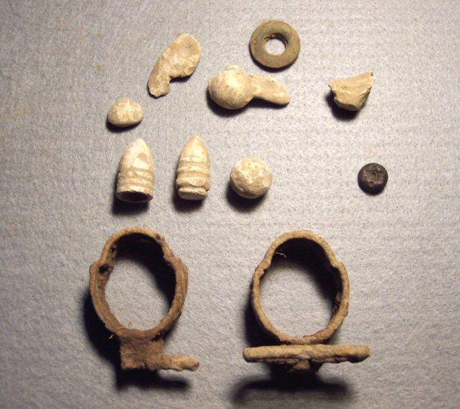 Relics recovered in small Yankee Camp, November 2nd, 2009, including 2 barrel bands, and one nice cuff size flower button .